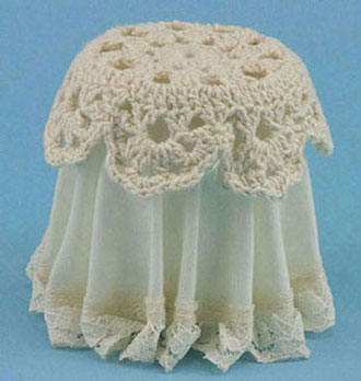 Ivory Lace Topped Skirted Table