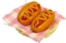 2 Hot Dogs with Mustard in a Basket