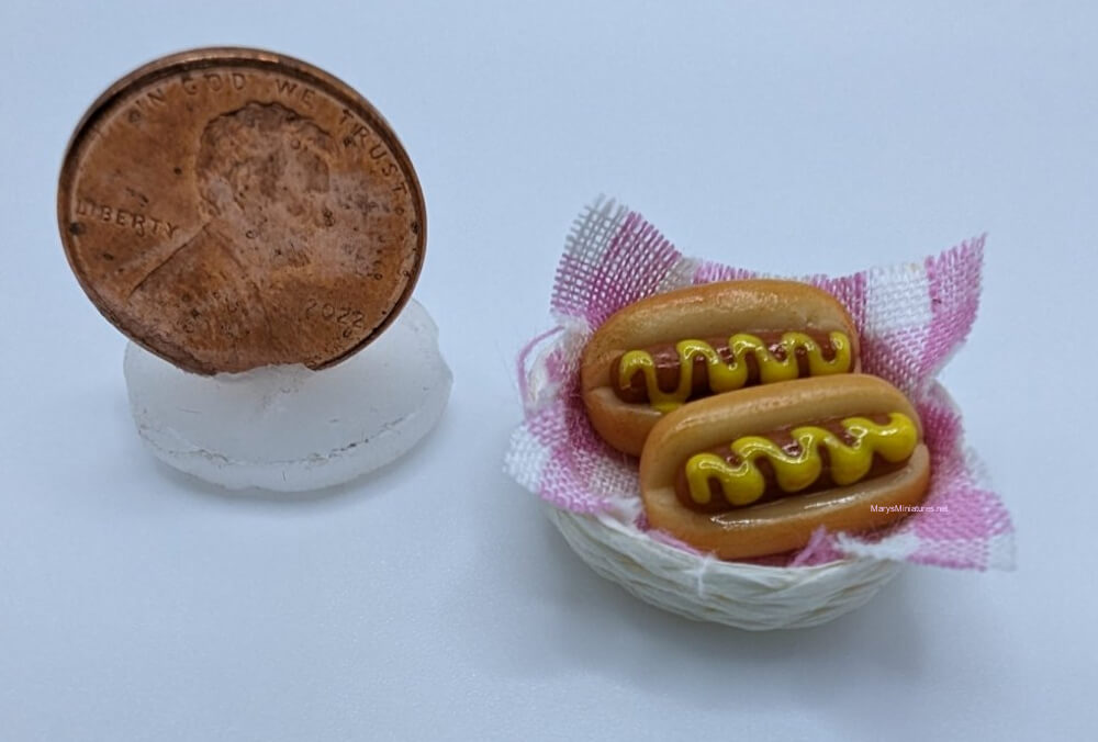 2 Hot Dogs with Mustard in a Basket