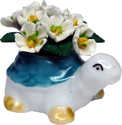 White Flowers in Turtle Planter